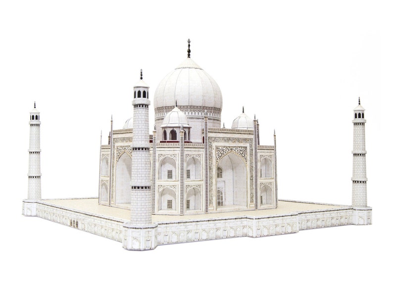 The angled exterior view of the 3D paper model of Taj Mahal shows its central dome, four kiosk domes, and four minarets which are aligned on a base.