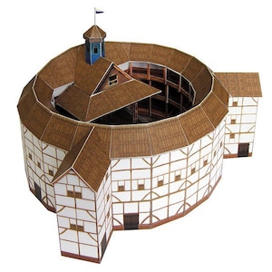 Assembled paper model of the Globe Theatre features an open-air central yard, a raised stage with a brown roof and a small blue tower, three tiers of roofed galleries around the yard. The model is made out of paper parts, printed on sturdy cardstock.