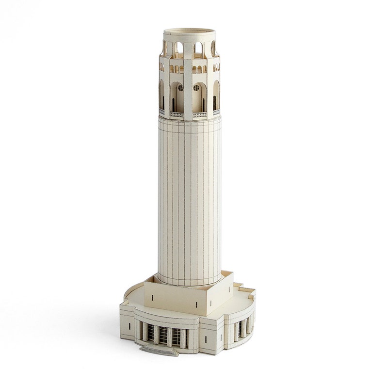 Assembled a 3D paper model of the Coit Tower, an iconic architectural landmark for San Francisco. The model is made out of beige cardboard pieces with black printed details.