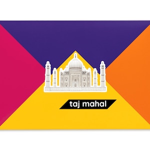 Product packaging for the Taj Mahal paper model kit. A recangular bright coloured cardstock envelope features four large triangles in yellow, magenta, purple and orange with an image of a finished model at the centre and the product title below.