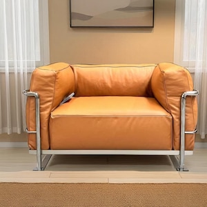 Handmade Orange Leather Armchair: Modern Accent Chair with Chrome Frame