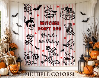May include: A rectangular fabric backdrop featuring a pink and white vertical striped pattern. The text reads "WITCHES DON'T AGE" and "Natali's birthday" in black and red. Illustrations include a witch, a cauldron, a skull, a cat, and bats.