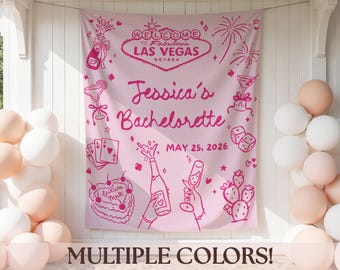 May include: Pink bachelorette party banner with Las Vegas theme. Features text "Welcome to Fabulous Las Vegas Nevada" and "Jessica's Bachelorette May 25, 2026". Includes illustrations of champagne, dice, and playing cards. Balloons in the foreground.