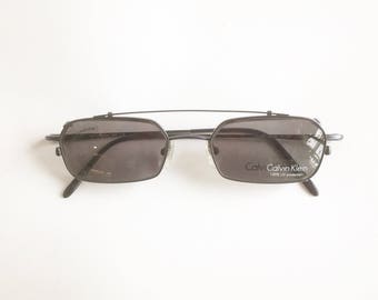 Vintage 1990's Calvin Klein Semi Rimless Eyeglasses with Clip Ons