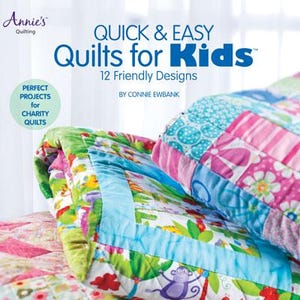 May include: A book titled "Quick & Easy Quilts for Kids" with 12 friendly designs by Connie Ewbanks. The cover features a stack of colorful quilts with a variety of patterns.