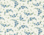 Moda Fabric - Shoreline by Camille Roskelley for Moda - 55308 11 - off-white background with small blue flowers - 100% cotton - 1/2 yard