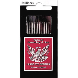 May include: A package of 12 large eye needles for millinery, made in England by Richard Hemming & Son. The package features a red label with a white phoenix and the text "Trade Mark" and "Large Eye Needles".