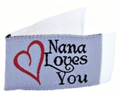 Tag It Ons -  Nana Loves You - 12 tags per packet. 1-1/8" x 5/8" - Little tags that can be attached to your quilts or crafts