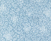 Moda Fabric - Shoreline by Camille Roskelley for Moda - 55304 22 - light blue background with small white flowers - 100% cotton - 1/2 yard