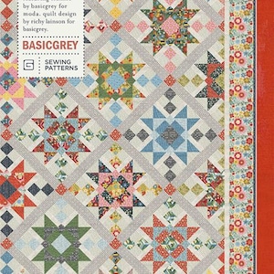 May include: A colorful quilt pattern featuring star-shaped designs in various colors like red, blue, green, and yellow. The quilt has a floral border and the text "HIGH KEY" and "PAT042". The pattern is by Basicgrey.