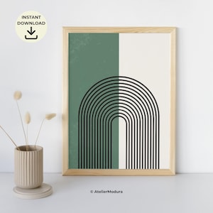 Peut inclure: Une impression d'art mural encadrée présentant un fond divisé en vert sauge et blanc cassé, superposé d'une série de lignes noires concentriques formant une arche symétrique. Le cadre est en bois clair et le texte AtelierModura est visible.