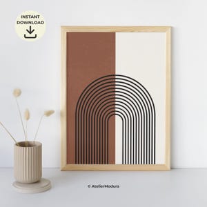 Op de afbeelding: Een ingelijste kunstdruk met een gespleten achtergrond in terracotta en gebroken wit. In het midden staat een zwarte lijngrafiek van concentrische bogen die een regenboogvorm vormen. De tekst "INSTANT DOWNLOAD" staat in de linkerbovenhoek.