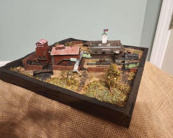 Diorama de mapa/compuesto inspirado en el enfrentamiento de Custom Hunt