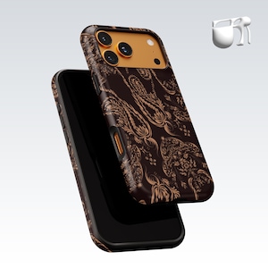 May include: A smartphone case featuring a dark brown background with a repeating light brown paisley pattern. The upper section includes a solid orange rectangular camera cutout area with three circular lens openings and a small flash aperture.
