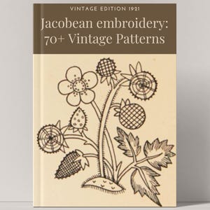 May include: A vintage book titled "Jacobean embroidery: 70+ Vintage Patterns" with a cream-colored cover. The cover features a black and white illustration of a floral design. The top of the book has the text "VINTAGE EDITION 1921".