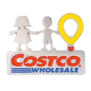 May include: A silver-colored pin featuring two stylized figures holding hands, with a yellow and red location marker. The pin has the Costco Wholesale logo in red and blue.