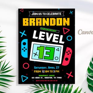 May include: A black and neon-colored invitation for a 13th birthday party. The invitation features a video game theme with a Nintendo Switch controller and a level up screen. The text on the invitation reads "Join us to celebrate Brandon Level 13".