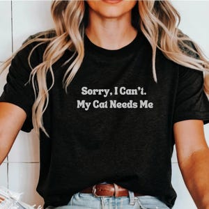 My Cat Needs Me Fun Cat T-Shirt for men and women cat lover shirt for crazy cat lady gift idea for pet owners funny cat shirt for cat mom