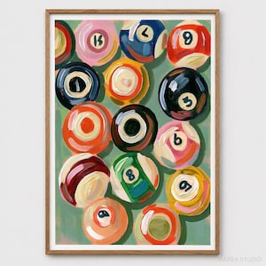 May include: An oil painting in a wooden frame featuring a collection of colorful billiard balls with visible brushstrokes. The balls are scattered across a muted green background, each displaying unique numbers and vibrant hues including red, blue, black, pink, and orange.