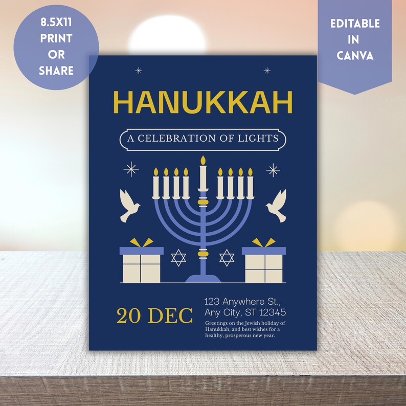 “Hanukkah invitation design with gold menorah, gifts, and doves on navy background reading ‘Hanukkah: A Celebration of Lights,’ displayed on a modern desk with warm lighting.”