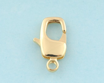May include: Gold-toned metal lobster clasp with a spring-loaded closure. The clasp is designed for attaching jewelry or other items.