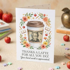 May include: A folded greeting card with a coffee cup design, surrounded by flowers, apples, and books. The cup features a portrait of Andrew Jackson. Text reads, "THANKS A LATTE FOR ALL YOU DO!" and "Your hard work is appreciated."