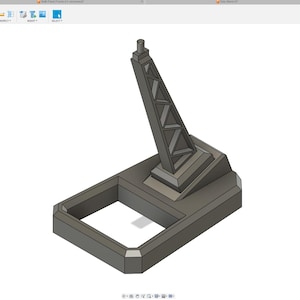 May include: A 3D printed model of a gray metal stand with a tall, triangular support structure. The stand has a rectangular base with a square opening in the center.