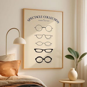May include: A framed print featuring a collection of eyeglasses from the Harry Potter series. The print displays five different eyeglass styles in black against a cream background, with the words "Spectacle Collection of Harry Potter" at the top.