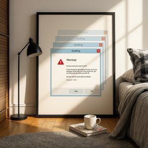 May include: Framed art print featuring a computer-style pop-up window with the word "Quitting" and a warning message. The message asks if the user is sure they want to quit, with "Yes" and "No" buttons. The print is in a black frame.
