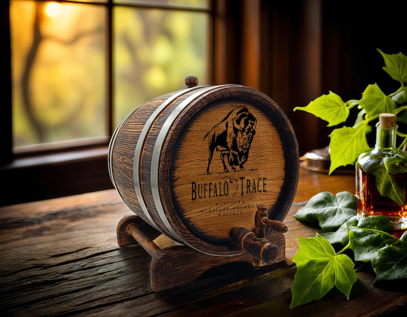 May include: A wooden barrel with a metal band and a spigot. The barrel is decorated with a buffalo silhouette and the text "Buffalo Trace Kentucky Straight Bourbon Whiskey".