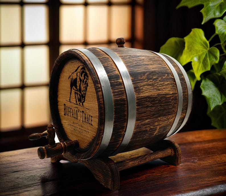 May include: A wooden barrel with metal bands, featuring a buffalo silhouette and the text "Buffalo Trace Kentucky Straight Bourbon Whiskey". The barrel is on a wooden stand with a spigot.