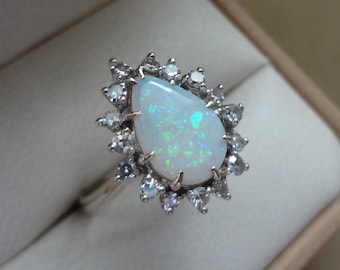 10K Pear Shape Opal & Diamond Halo Ring - Size 8