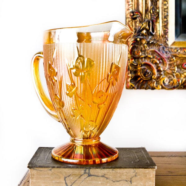 Iridescent peach carnival glass pitcher