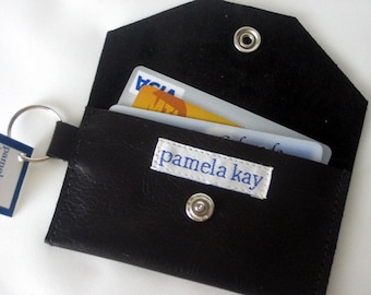 Cartera con llavero de identificación en cuero negro suave