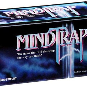 May include: A rectangular MindTrap board game box with a black and blue gradient background featuring lightning effects. The title MindTrap is printed in large silver lettering with the subtitle The game that will challenge the way you think.