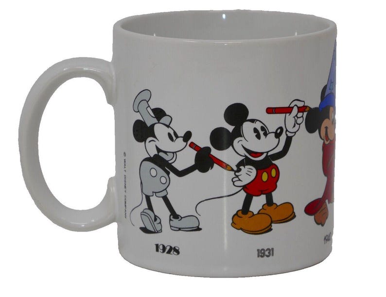 Taza de cerámica de 355 ml (Aplausos, Disney Mickey Mouse a través de los años) imagen 1