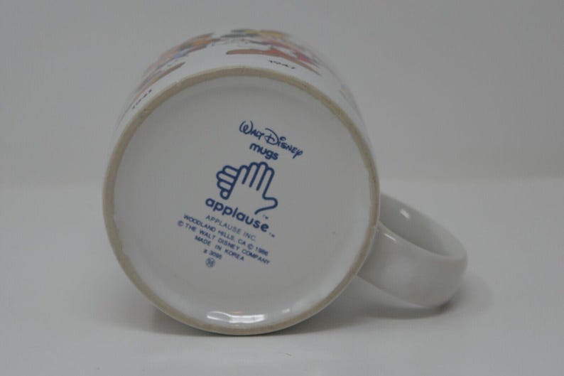 Taza de cerámica de 355 ml (Aplausos, Disney Mickey Mouse a través de los años) imagen 6