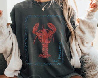 Camiseta gráfica vintage de pescador: camiseta extragrande con langosta y colores Coastal Comfort