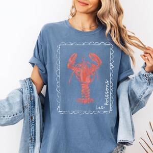 Lobster shirt detail showing coastal graphic print on cotton tee
