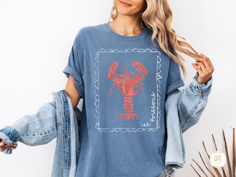 Lobster shirt detail showing coastal graphic print on cotton tee