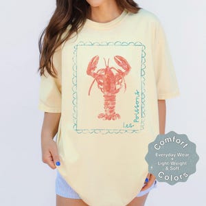 Coastal graphic tee with lobster design styled as nautical shirt for women