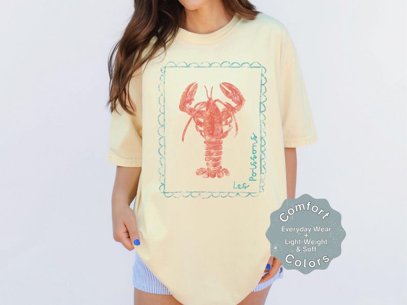 Coastal graphic tee with lobster design styled as nautical shirt for women