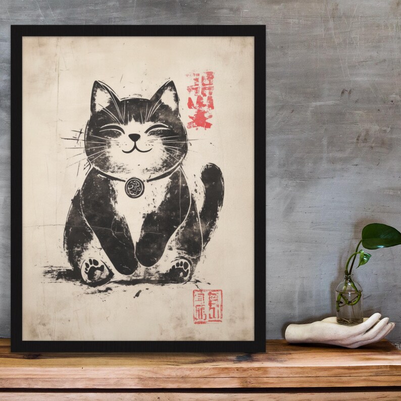 Ink wash illustration of a chubby smiling cat medallion necklace and authentic Japanese stamp accents.