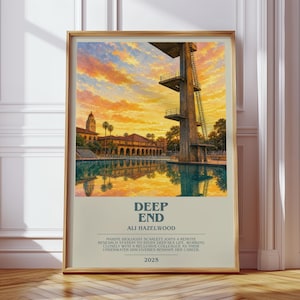 May include: A framed rectangular poster featuring a sunset over a swimming pool with a tall diving platform. The text reads DEEP END, ALI HAZELWOOD, a summary of a marine biologist's research, and the year 2025 on a light beige background.
