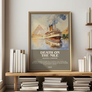 May include: A framed poster with a watercolour painting of a ship on a river, with pyramids in the background. The poster is titled "DEATH ON THE NILE" by Agatha Christie, with the year 1937 displayed below the title.