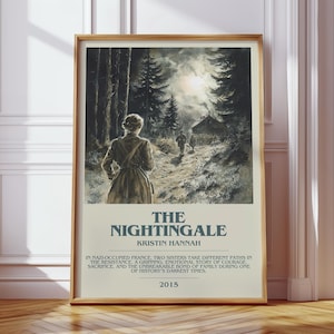 May include: A framed print of "The Nightingale" by Kristin Hannah. The artwork depicts a woman walking on a path towards a cabin in a forest. The title and author's name are displayed below the image, along with a summary and the year 2015.