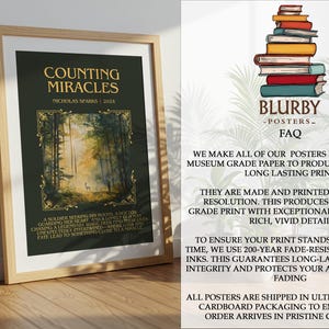 May include: A framed poster titled "Counting Miracles" by Nicholas Sparks, 2024. The artwork features a forest scene with a deer and a person. The poster is displayed on a wooden floor, leaning against a white wall. The poster is from Blurby Posters.