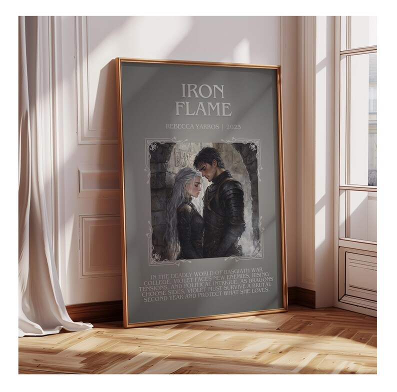 May include: Framed art print titled "Iron Flame" by Rebecca Yarros, 2023. The artwork features a couple in dark attire, set against a stone background. The print includes text describing the story's setting and plot.