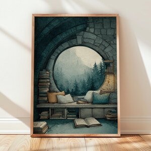 May include: Watercolor print of a cozy reading nook with a large circular window overlooking a forest. The scene includes stacks of books, pillows, and an open book on the floor. The artwork is framed in a light brown wooden frame.