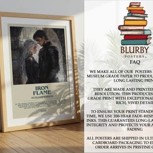 May include: Framed poster featuring a watercolor illustration of a man and woman in dark attire, with the text "IRON FLAME" and "REBECCA YARROS" in a tan border. The poster is displayed on a wooden surface.